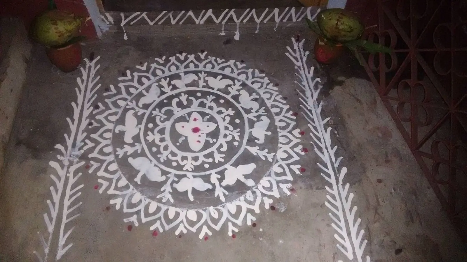 Alpona or drawings made right at the doorstep with chalk water is mandatory during marriage in any Bengali household in India.This is regarded as auspicious